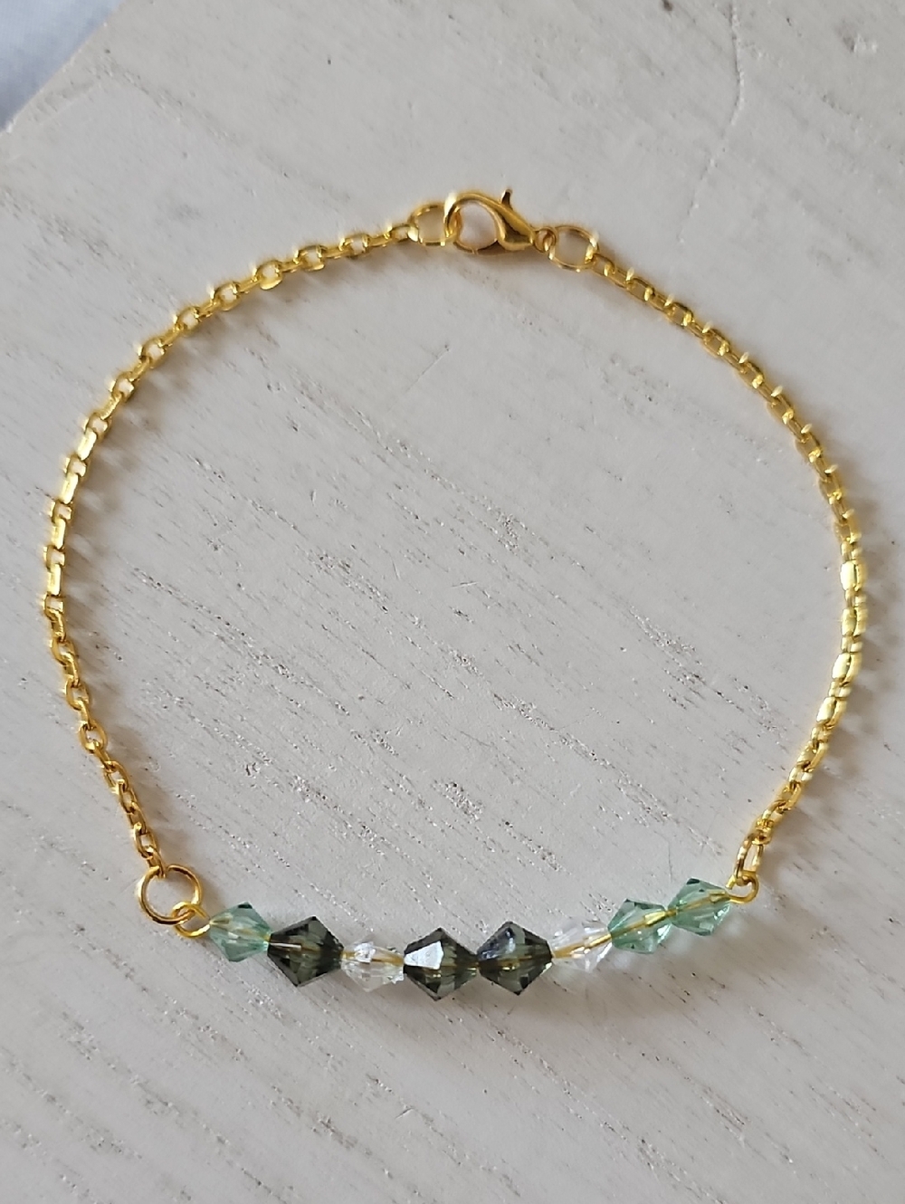 Delicate Gold Chain Bracelet with Green and Clear Faceted Beads